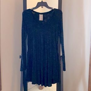 Long sleeve swing top with ruffles on the bottom